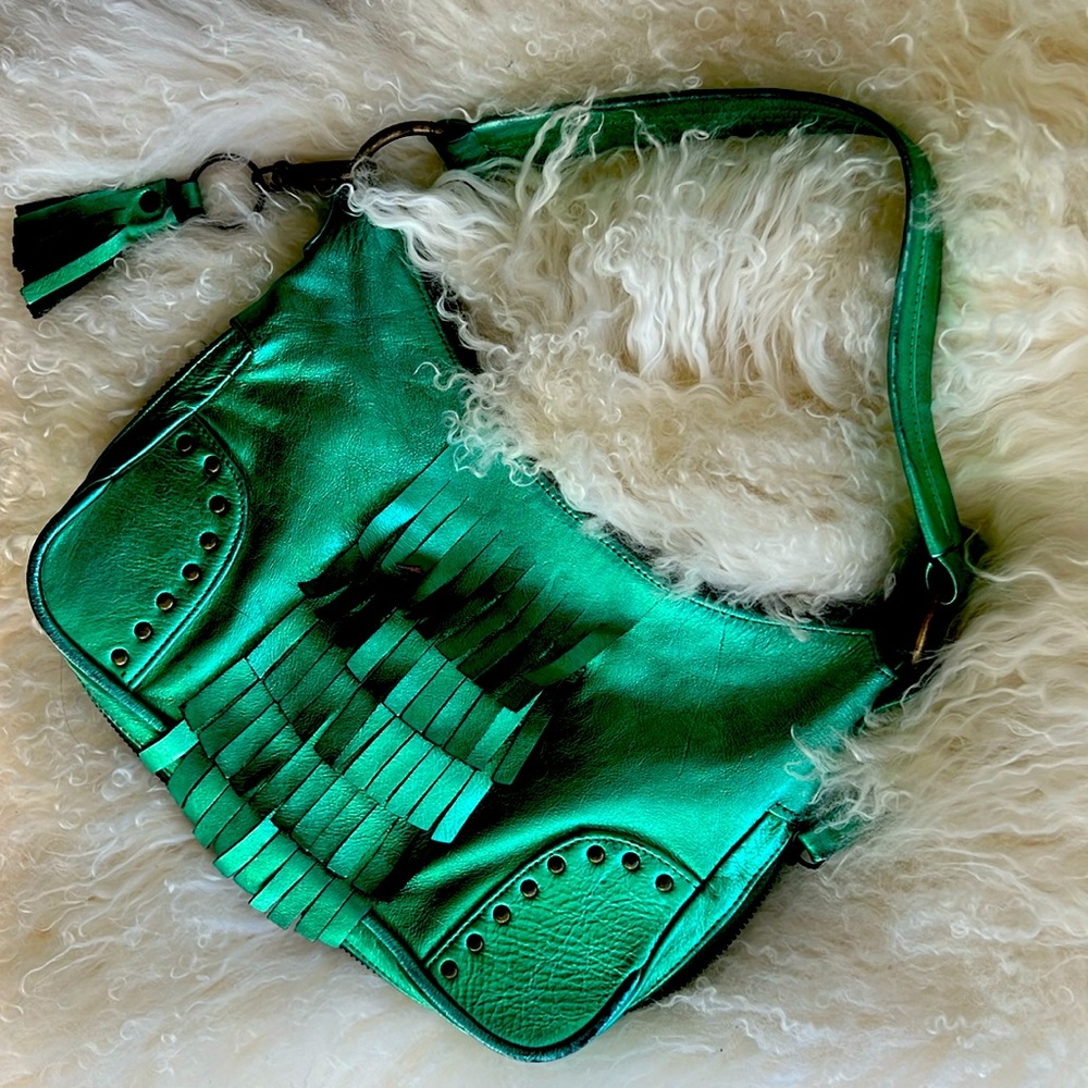 Meralized green jade leather bag with fringes.